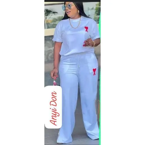 Share this product    Queen Bee Nigerian Made Women’s Two-Piece Lounge Set – Oversized T-Shirt & Wide-Leg Pants (White)
